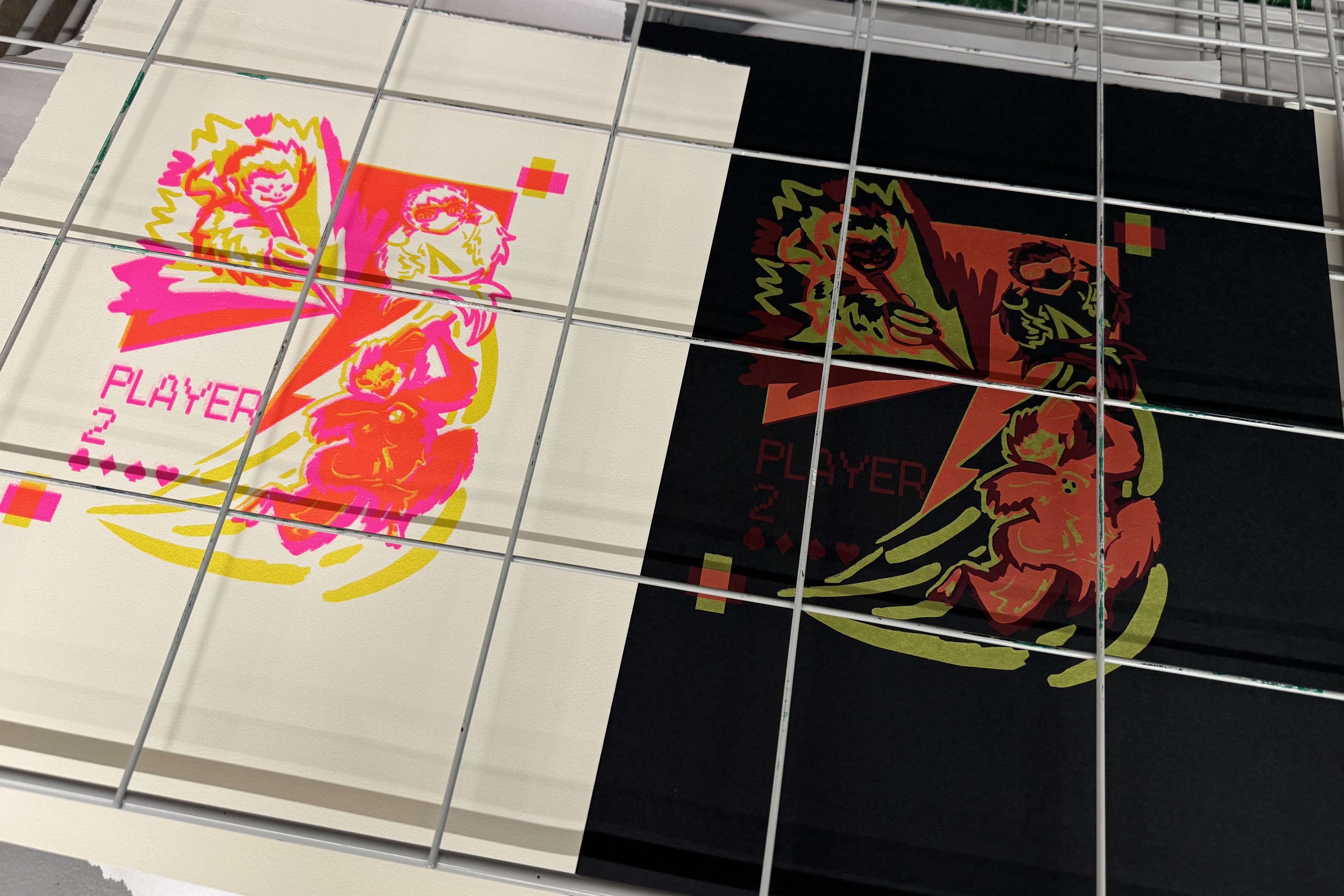 A photo of two different Ready Player 2 prints on the rack