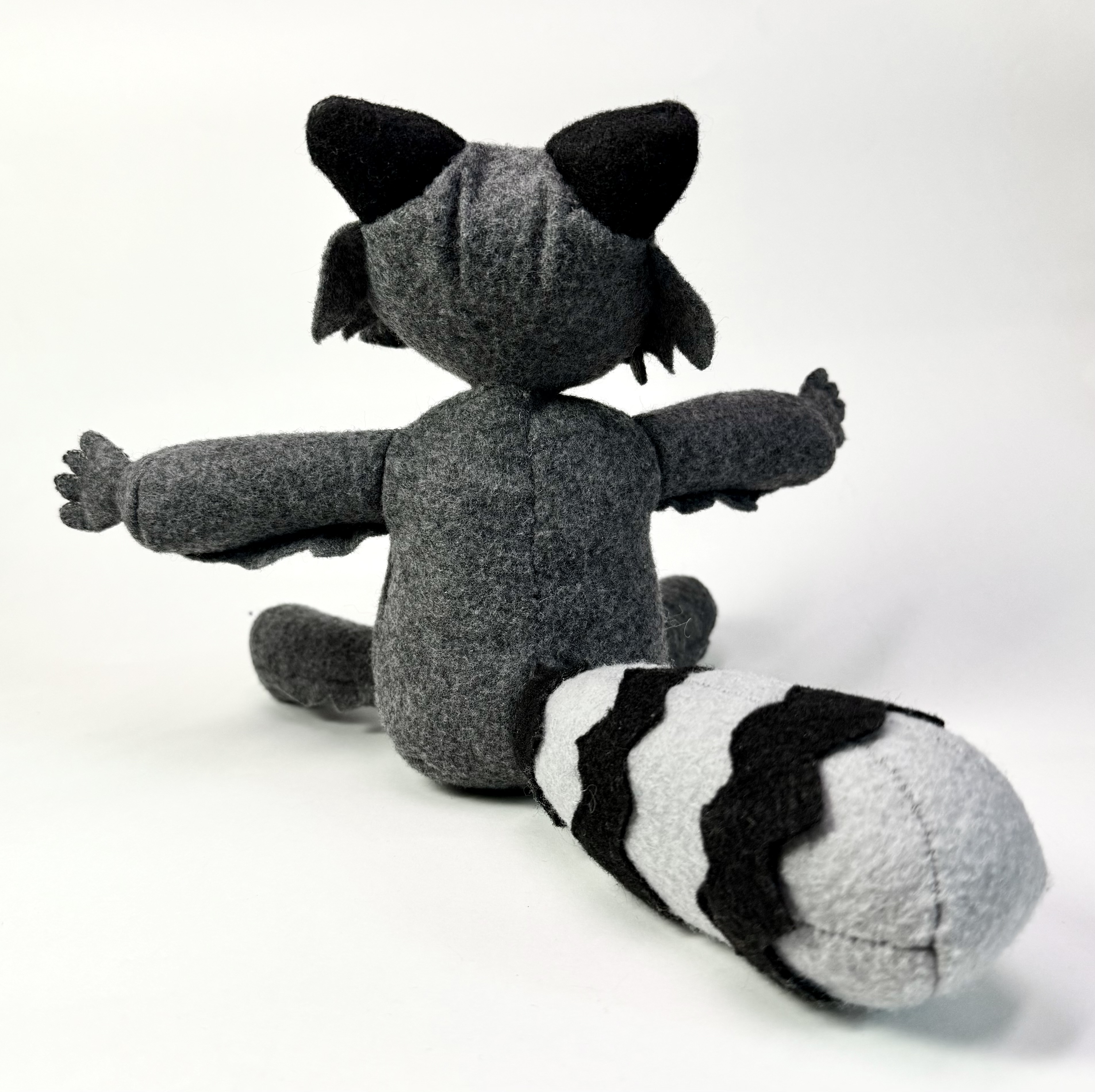 Back view of the Ringo the Raccoon stuffed animal