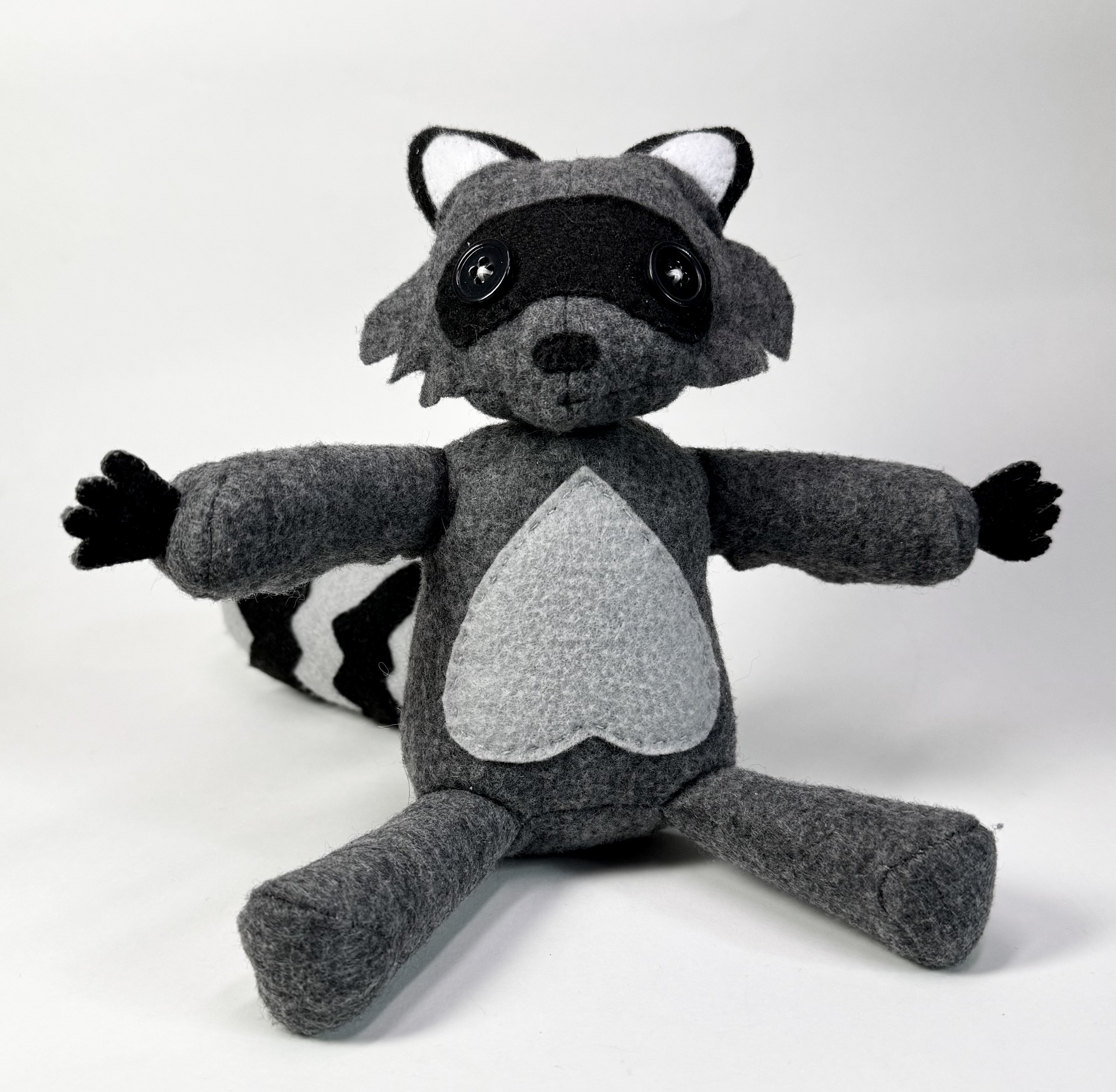 Front view of the Ringo the Raccoon stuffed animal