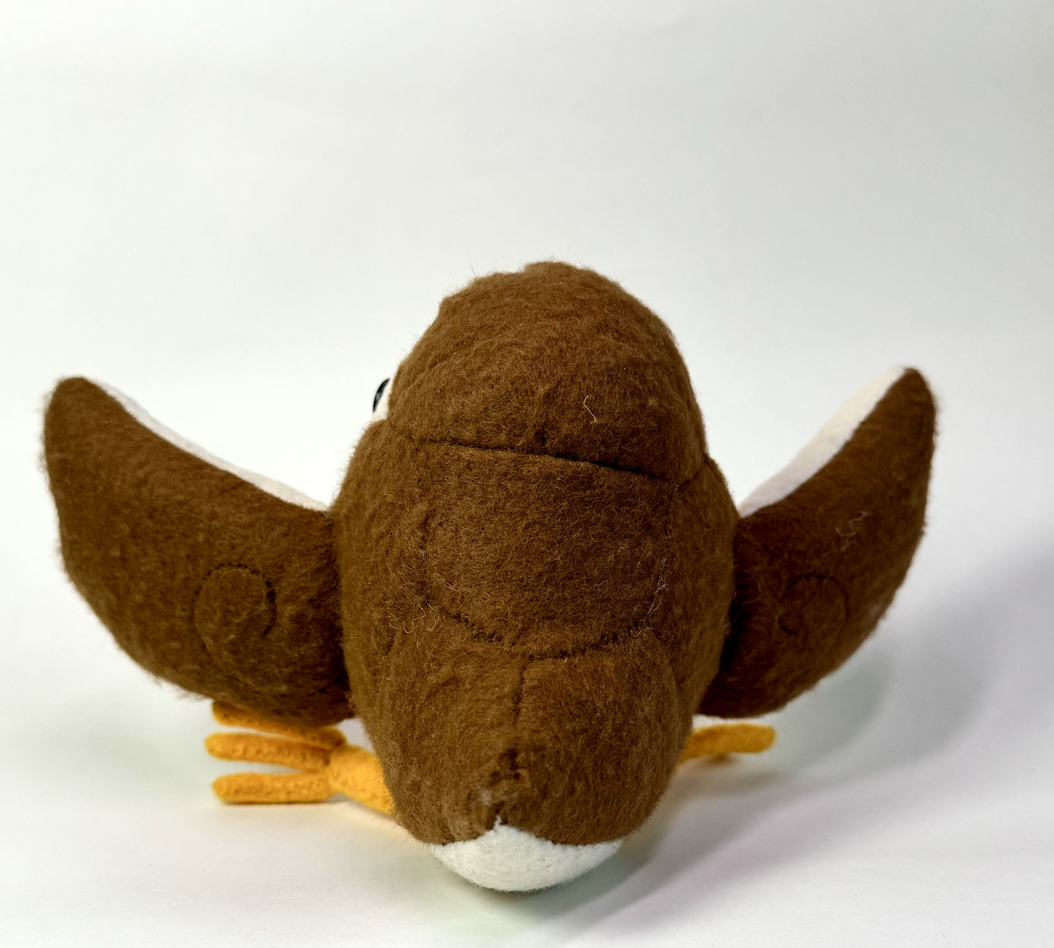 Back view of the Sibella the sparrow stuffed animal