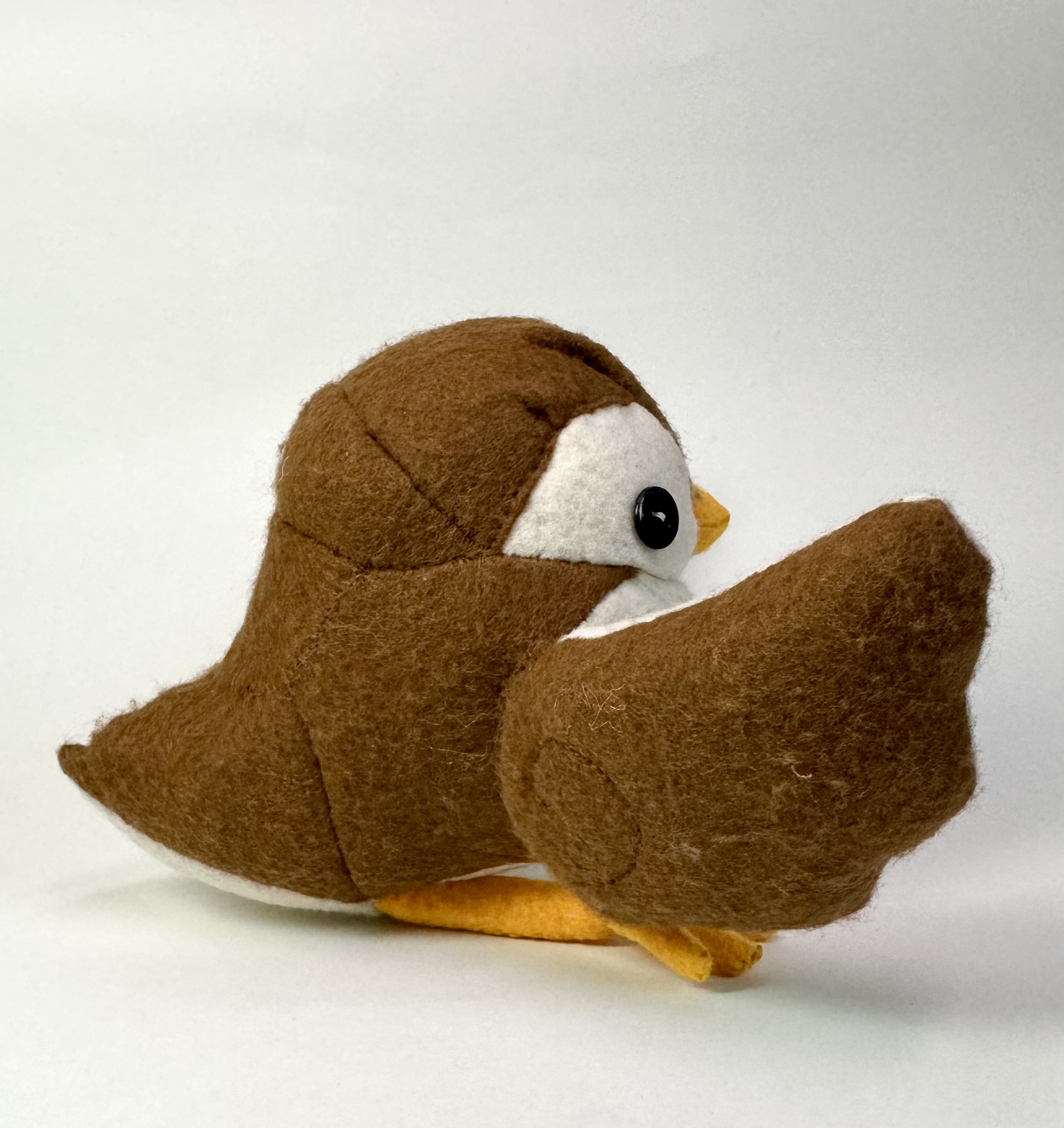 Right view of the Sibella the sparrow stuffed animal