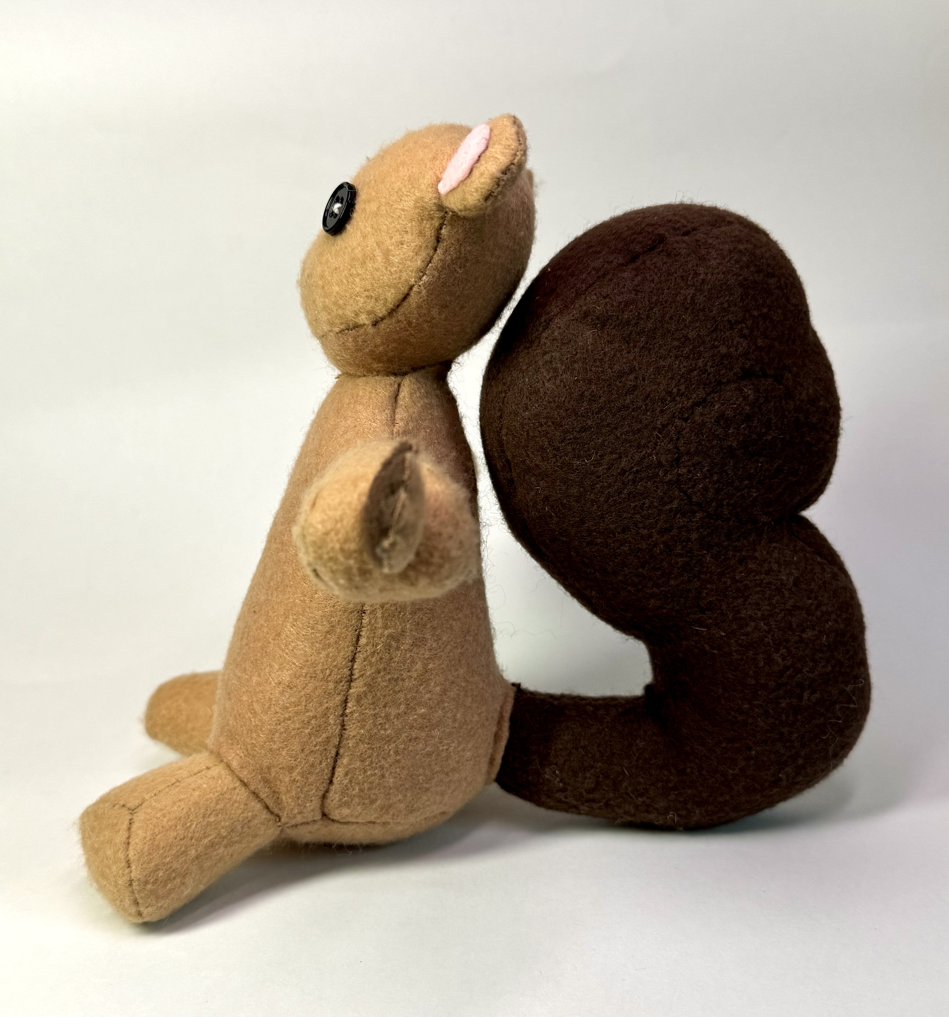 Left view of the Shirell the Squirrel stuffed animal